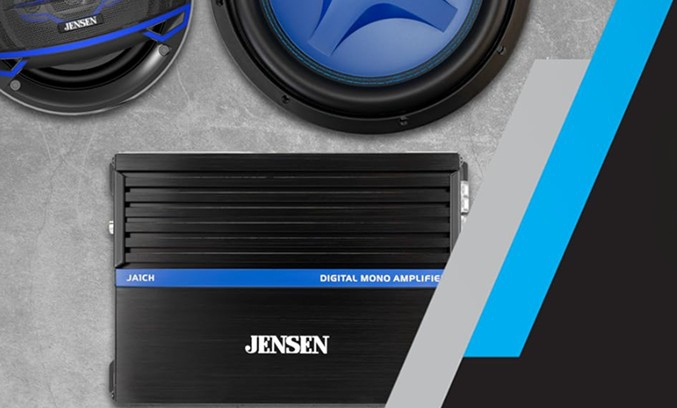 JA1CH Amp next to subwoofer and speaker